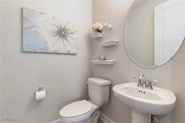 7619 Morgan Way, Naples, FL 34119 - half bath featuring toilet and baseboards