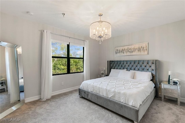 7619 Morgan Way, Naples, FL 34119 - bedroom with carpet floors, a chandelier, and baseboards