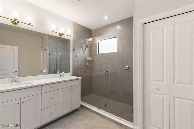 7619 Morgan Way, Naples, FL 34119 - full bathroom featuring double vanity, tile patterned floors, and a shower stall