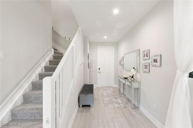 7619 Morgan Way, Naples, FL 34119 - foyer with stairs, recessed lighting, light wood-type flooring, and baseboards
