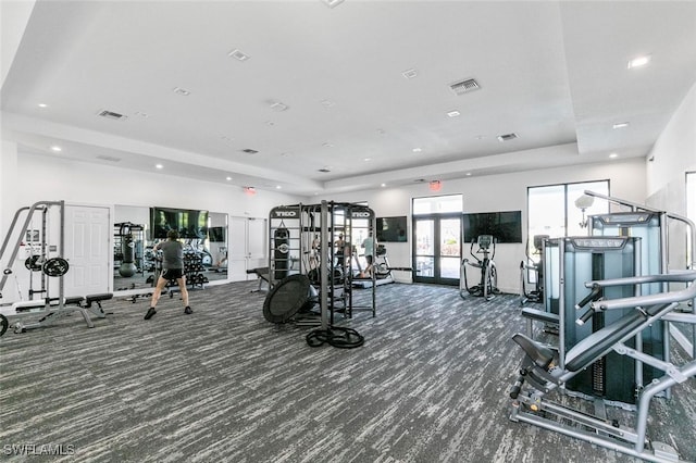 7619 Morgan Way, Naples, FL 34119 - exercise room with carpet flooring, french doors, recessed lighting, and a raised ceiling