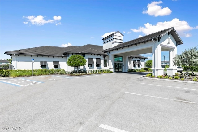 7619 Morgan Way, Naples, FL 34119 - view of building exterior with uncovered parking