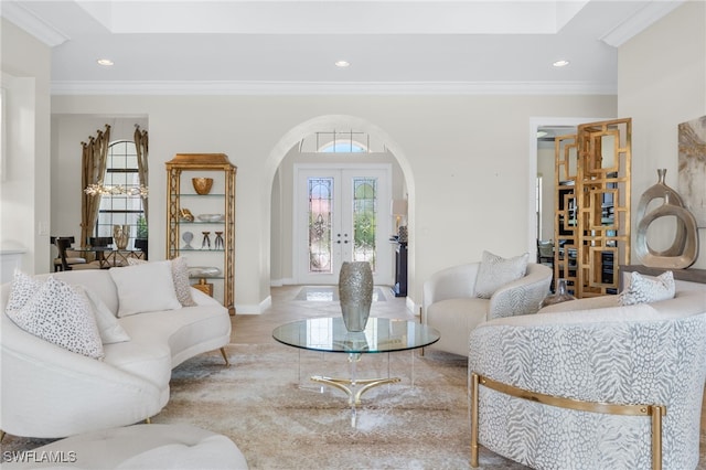 14500 Marsala Way, Naples, FL 34109 - living area with arched walkways, ornamental molding, recessed lighting, french doors, and baseboards