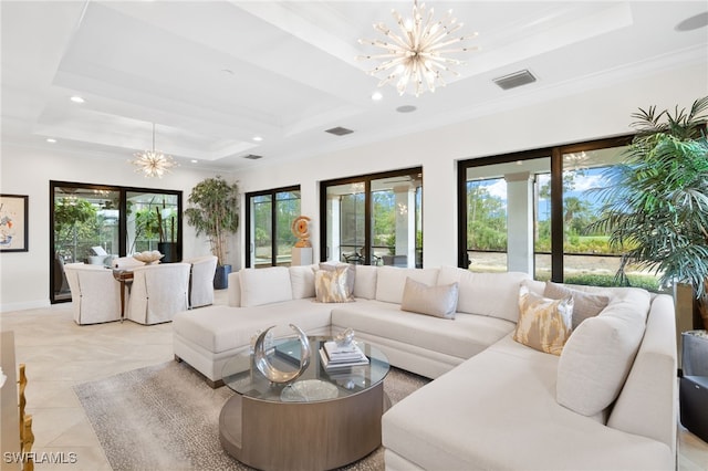 14500 Marsala Way, Naples, FL 34109 - living area featuring a chandelier, healthy amount of natural light, recessed lighting, ornamental molding, and a raised ceiling