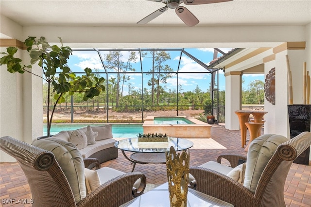 14500 Marsala Way, Naples, FL 34109 - view of patio with outdoor lounge area, ceiling fan, an in-ground hot tub, an outdoor pool, and a lanai