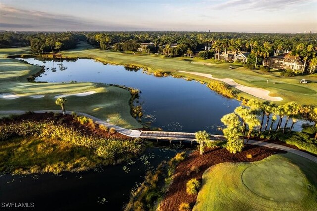 2366 Alexander Palm Dr, Naples, FL 34105 - aerial perspective of suburban area featuring a local golf course and a large body of water