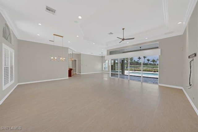 2366 Alexander Palm Dr, Naples, FL 34105 - unfurnished living room featuring crown molding, ceiling fan, a raised ceiling, baseboards, and recessed lighting