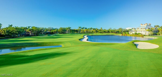 2366 Alexander Palm Dr, Naples, FL 34105 - surrounding community featuring view of golf course and a water view