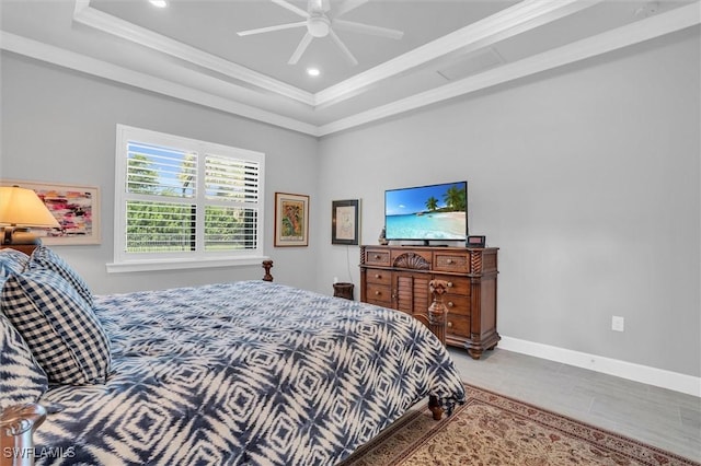14037 Hawks Eye Ct, Estero, FL 33928 - bedroom featuring a raised ceiling, ornamental molding, recessed lighting, a ceiling fan, and baseboards