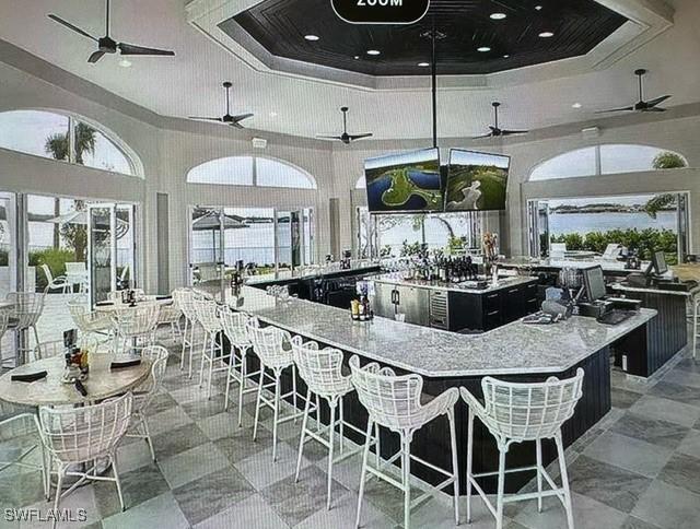 14037 Hawks Eye Ct, Estero, FL 33928 - view of patio / terrace with ceiling fan