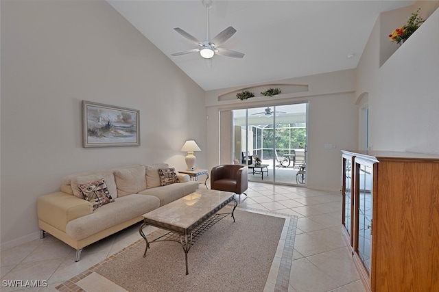 8279 Ibis Cove Cir Unit A136, Naples, FL 34119 - living area with high vaulted ceiling, a ceiling fan, and light tile patterned floors