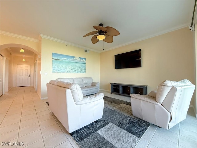 10350 Washingtonia Palm Way Unit 4213, Fort Myers, FL 33966 - living area with light tile patterned flooring, arched walkways, ceiling fan, crown molding, and baseboards
