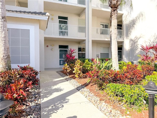 10350 Washingtonia Palm Way Unit 4213, Fort Myers, FL 33966 - entrance to property with stucco siding