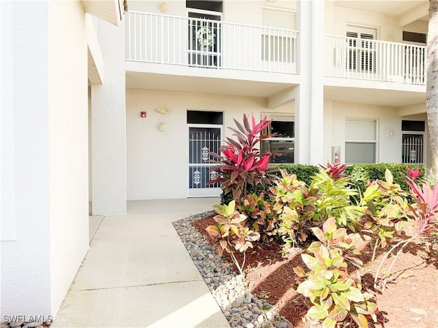 10350 Washingtonia Palm Way Unit 4213, Fort Myers, FL 33966 - property entrance with stucco siding