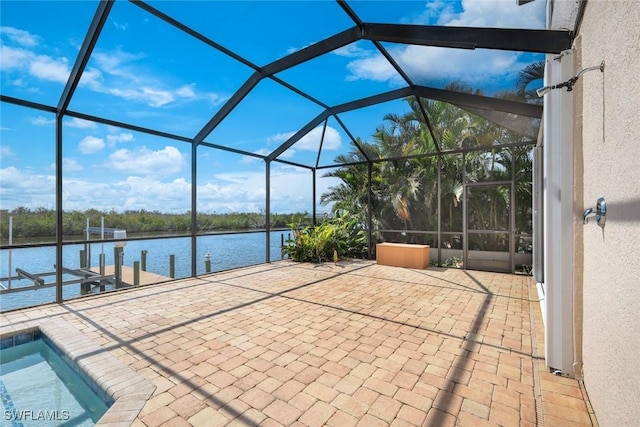 1128 NW 43rd Ave, Cape Coral, FL 33993 - view of patio / terrace with a boat dock, a water view, a lanai, and boat lift