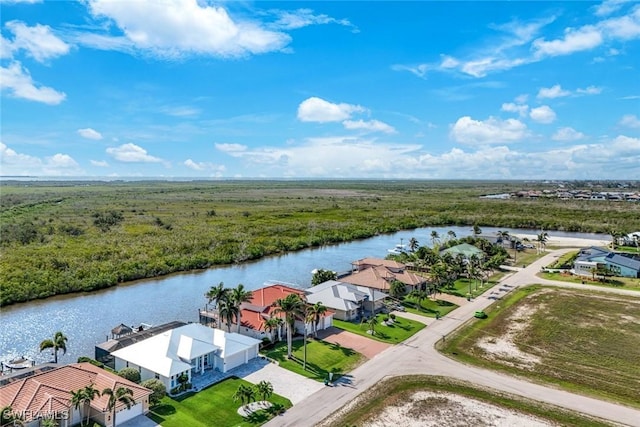 1128 NW 43rd Ave, Cape Coral, FL 33993 - aerial view of residential area with a large body of water