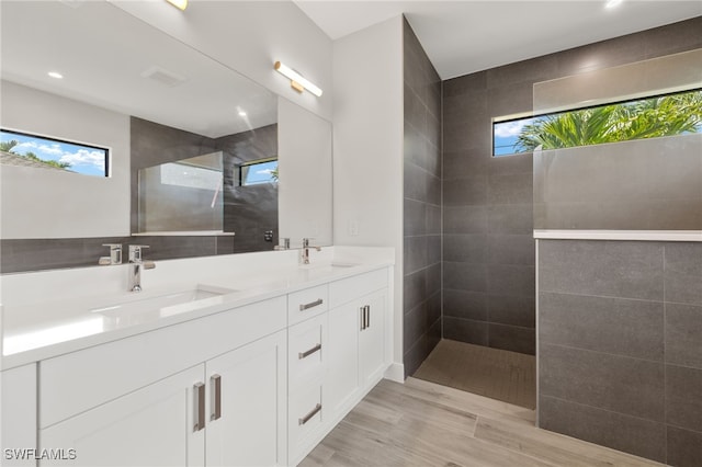 2110 SW 52nd Ter, Cape Coral, FL 33914 - full bathroom featuring double vanity, a walk in shower, and recessed lighting
