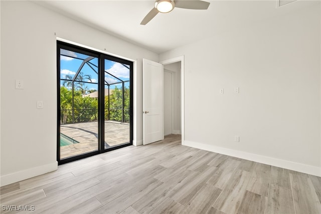 2110 SW 52nd Ter, Cape Coral, FL 33914 - unfurnished room featuring a ceiling fan, baseboards, and light wood finished floors