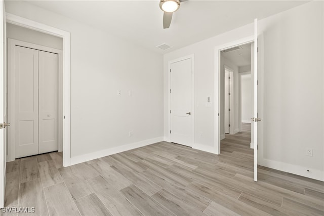 2110 SW 52nd Ter, Cape Coral, FL 33914 - unfurnished bedroom featuring light wood-style flooring, baseboards, and ceiling fan