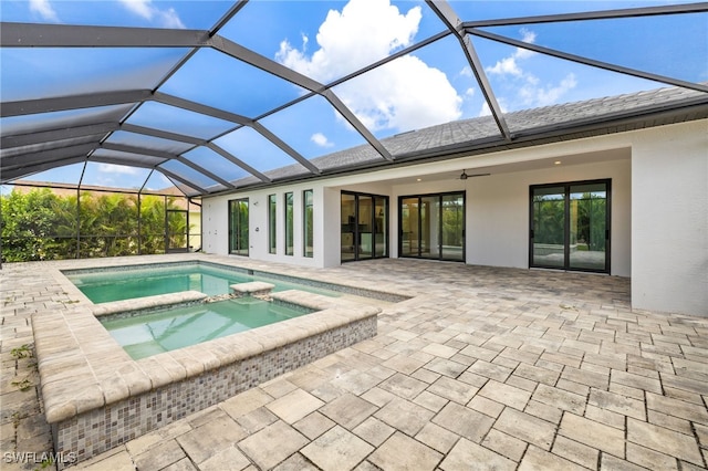 2110 SW 52nd Ter, Cape Coral, FL 33914 - view of swimming pool with a patio area, a ceiling fan, a pool with connected hot tub, and a lanai