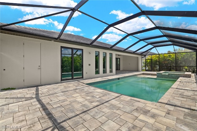 2110 SW 52nd Ter, Cape Coral, FL 33914 - view of swimming pool featuring a patio, a pool with connected hot tub, and a lanai