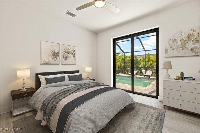 2110 SW 52nd Ter, Cape Coral, FL 33914 - bedroom featuring access to outside, wood finished floors, and ceiling fan