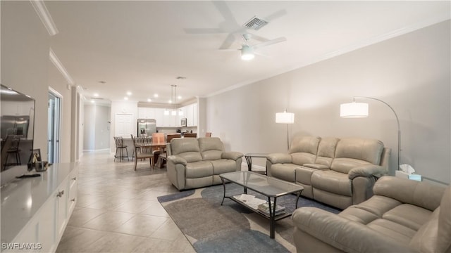 9076 Glenforest Dr, Naples, FL 34120 - living area with crown molding, ceiling fan, light tile patterned floors, baseboards, and recessed lighting
