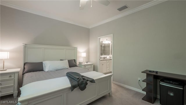 9076 Glenforest Dr, Naples, FL 34120 - bedroom with light colored carpet, crown molding, connected bathroom, baseboards, and a ceiling fan