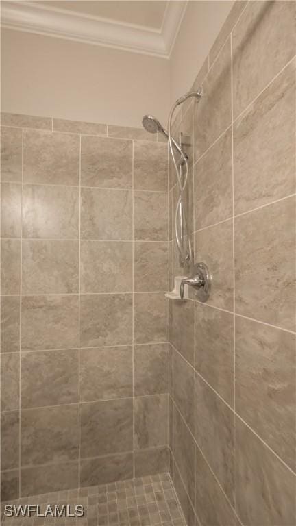 9076 Glenforest Dr, Naples, FL 34120 - full bathroom with crown molding and tiled shower