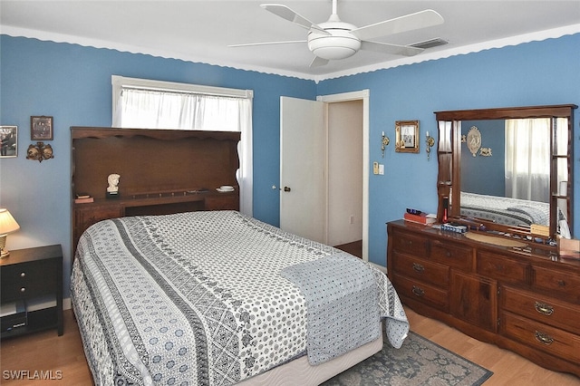 19006 Flamingo Rd, Fort Myers, FL 33967 - bedroom with light wood finished floors and ceiling fan