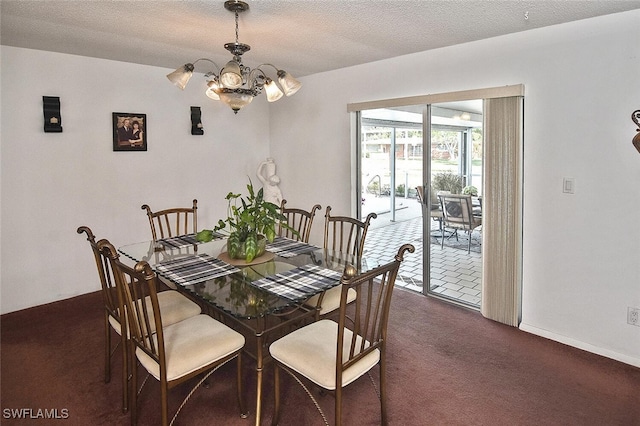 19006 Flamingo Rd, Fort Myers, FL 33967 - dining room featuring dark carpet, a chandelier, and a textured ceiling