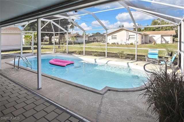 19006 Flamingo Rd, Fort Myers, FL 33967 - outdoor pool with glass enclosure, a patio area, and a lawn