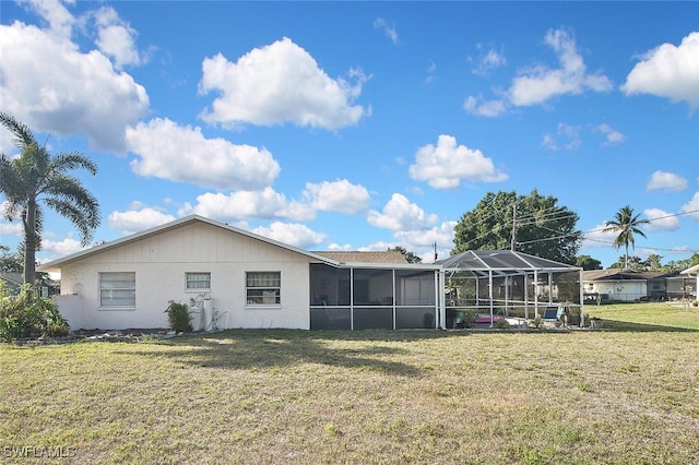19006 Flamingo Rd, Fort Myers, FL 33967 - back of house featuring a yard and stucco siding
