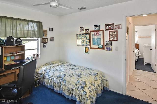 19006 Flamingo Rd, Fort Myers, FL 33967 - tiled bedroom with carpet flooring and a ceiling fan