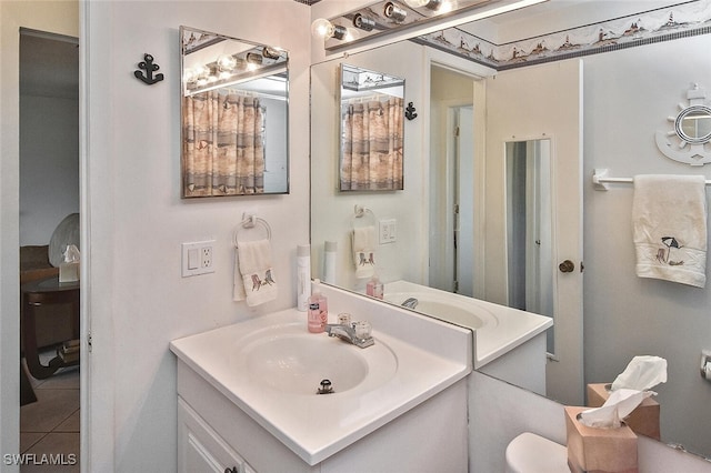19006 Flamingo Rd, Fort Myers, FL 33967 - bathroom with vanity, tile patterned flooring, and toilet