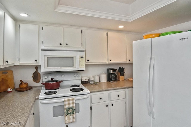 19006 Flamingo Rd, Fort Myers, FL 33967 - kitchen with white appliances, white cabinetry, recessed lighting, light countertops, and ornamental molding