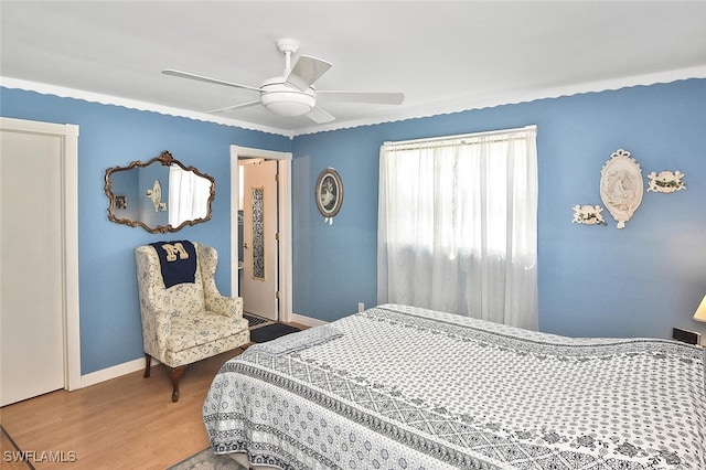 19006 Flamingo Rd, Fort Myers, FL 33967 - bedroom featuring wood finished floors, baseboards, and a ceiling fan