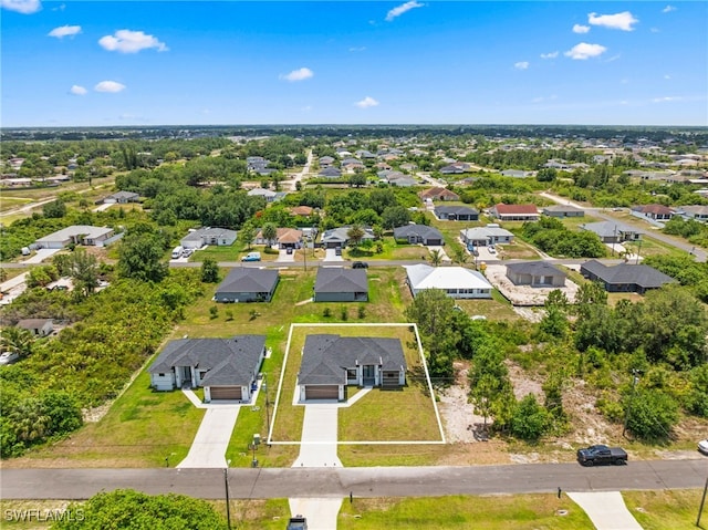 2513 13th St SW, Lehigh Acres, FL 33976 - aerial perspective of suburban area featuring property boundaries highlighted