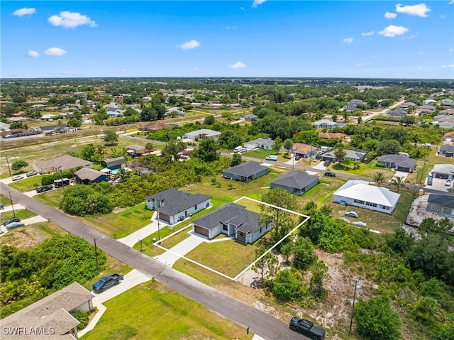 2513 13th St SW, Lehigh Acres, FL 33976 - aerial view of residential area with property boundaries highlighted