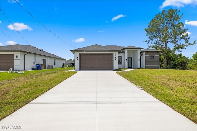 2513 13th St SW, Lehigh Acres, FL 33976 - prairie-style home with concrete driveway, an attached garage, a front yard, and stucco siding