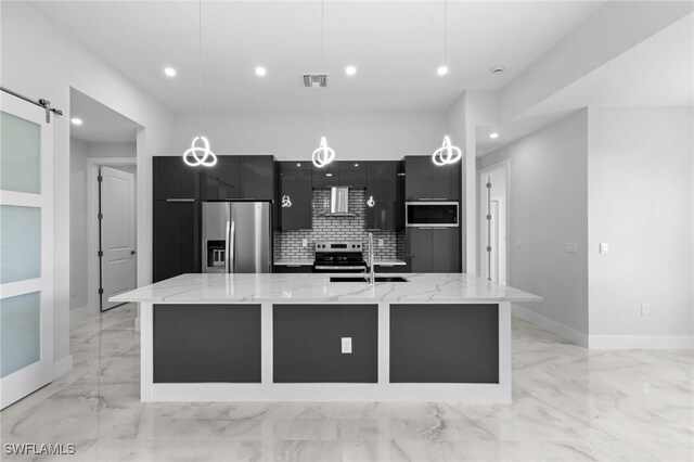 2513 13th St SW, Lehigh Acres, FL 33976 - kitchen with appliances with stainless steel finishes, dark cabinetry, modern cabinets, wall chimney exhaust hood, and a sink