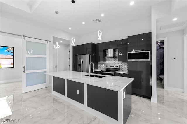 2513 13th St SW, Lehigh Acres, FL 33976 - kitchen with appliances with stainless steel finishes, dark cabinetry, a sink, modern cabinets, and wall chimney range hood