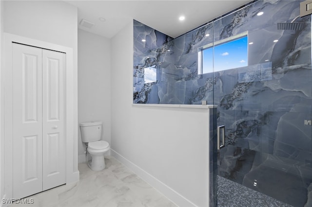 2513 13th St SW, Lehigh Acres, FL 33976 - bathroom featuring toilet, a marble finish shower, marble finish flooring, a closet, and baseboards