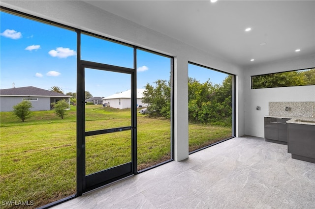 2513 13th St SW, Lehigh Acres, FL 33976 - view of unfurnished sunroom