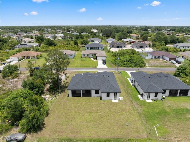 2513 13th St SW, Lehigh Acres, FL 33976 - aerial perspective of suburban area