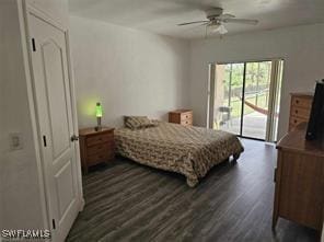 718 Jefferson Ave, Lehigh Acres, FL 33936 - bedroom featuring access to exterior, dark wood-style floors, and a ceiling fan