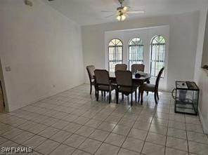 718 Jefferson Ave, Lehigh Acres, FL 33936 - dining space with a ceiling fan and light tile patterned flooring