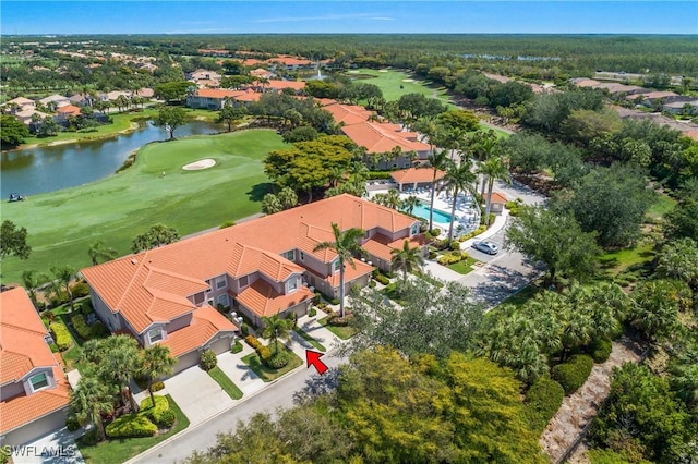 23560 Wisteria Pointe Dr Unit 506, Estero, FL 34135 - aerial view of residential area featuring a nearby body of water, a golf club, and a pool