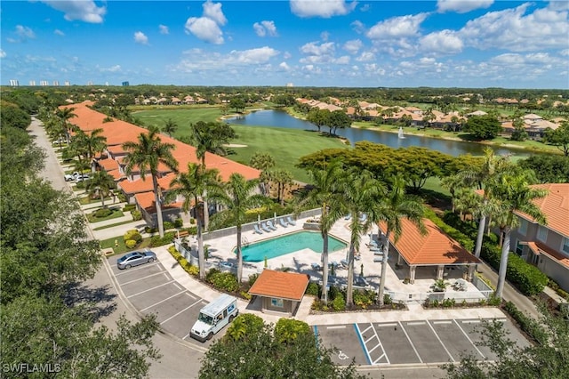 23560 Wisteria Pointe Dr Unit 506, Estero, FL 34135 - aerial view of residential area featuring a nearby body of water, a pool, and a golf club
