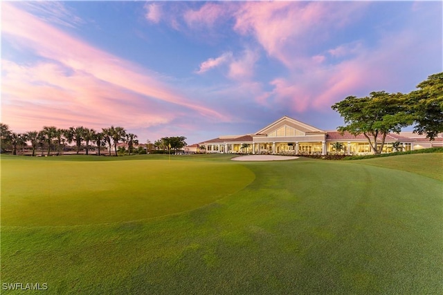 23560 Wisteria Pointe Dr Unit 506, Estero, FL 34135 - view of home's community featuring view of golf course and an area to practice putting